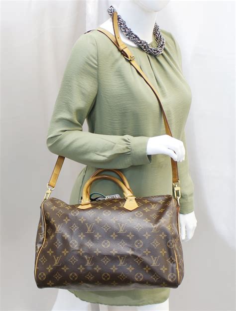 louis vuitton speedy bandouliere 35 whith charm|louis vuitton speedy 35 price.